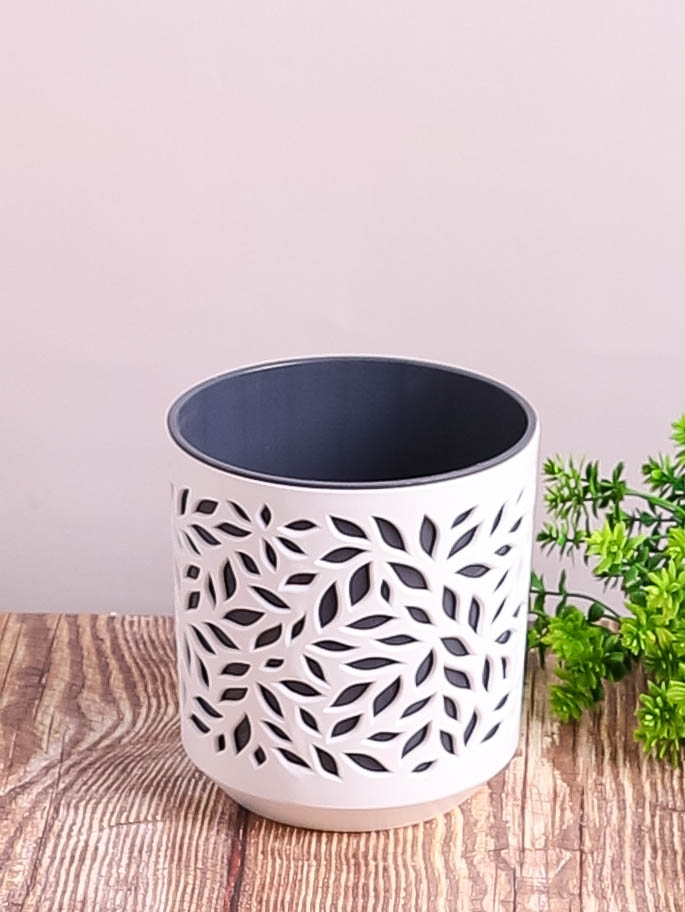 Кашпо из пластика "Leaves" 1,25л. h13.5см,d13см белый/антрацит Кашпо из пластика "Leaves" 1,25л. h13.5см,d13см белый/антрацит