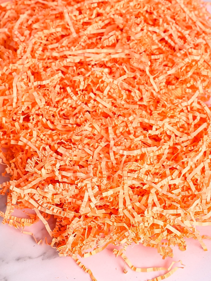 Наполнитель флористический бумажный 100г неон- оранжевый Наполнитель флористический бумажный 100г неон- оранжевый