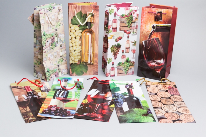 Сумочка ламинированная под бутылку 14х35х11см Сумочка ламинированная под бутылку 14х35х11см