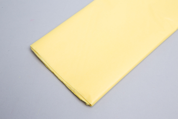 Бумага тишью  50х66см,10 лист. желтый