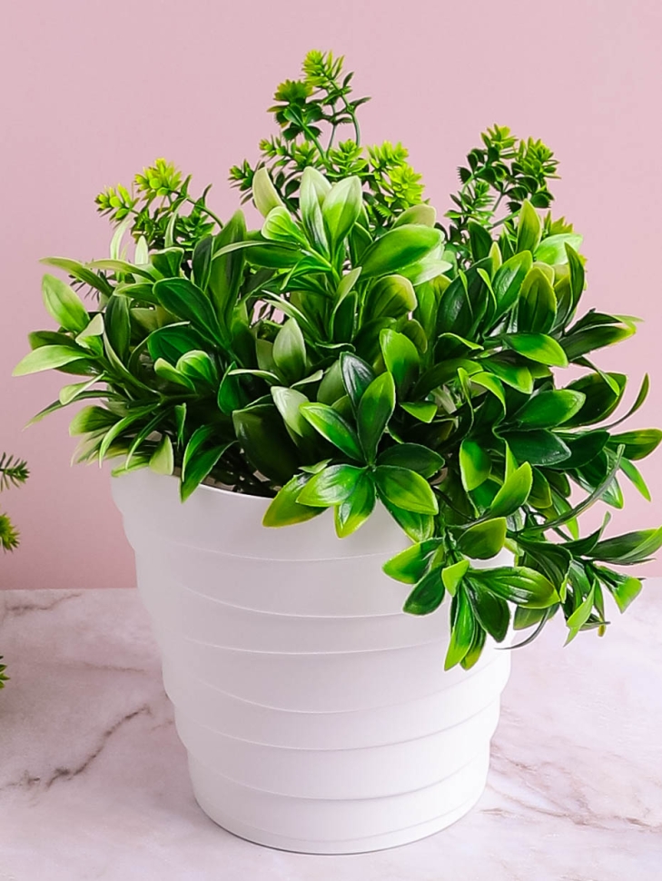 Кашпо из пластика "Бархан" 1,4л. h14.3см,d14,5 белый Кашпо из пластика "Бархан" 1,4л. h14.3см,d14,5 белый