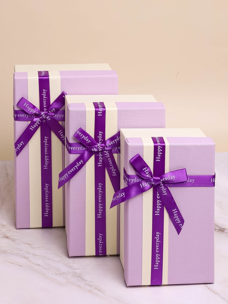 Коробка прямоугольник набор из 3шт 23х16х9см полоса с бантом белый/сиреневый микс Коробка прямоугольник набор из 3шт 23х16х9см полоса с бантом белый/сиреневый микс