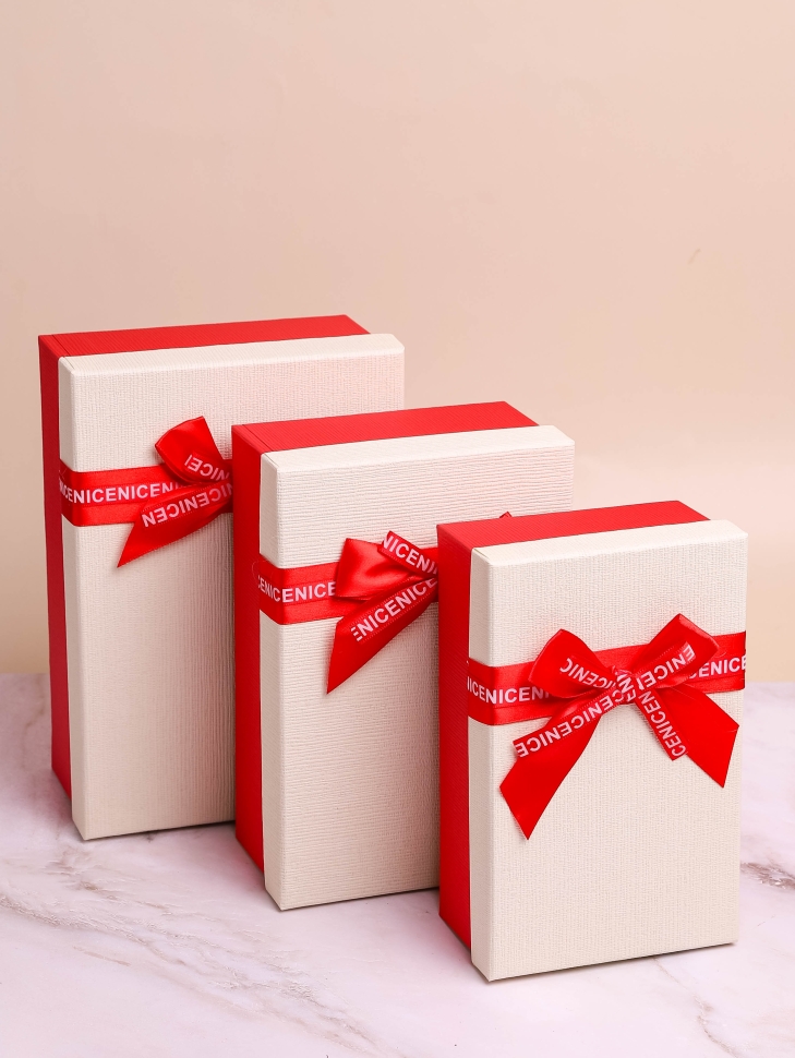 Коробка прямоугольник набор из 3шт 23х16х9см крышка белая/красный,бант красный Коробка прямоугольник набор из 3шт 23х16х9см крышка белая/красный,бант красный