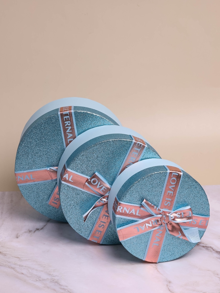 Коробка цилиндр набор из 3шт d20хh10 - d16-h7см с бантом голубой Коробка цилиндр набор из 3шт d20хh10 - d16-h7см с бантом голубой