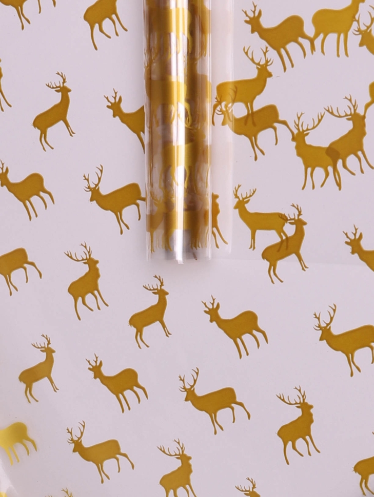 Пленка цветная Северные олени 70см золото